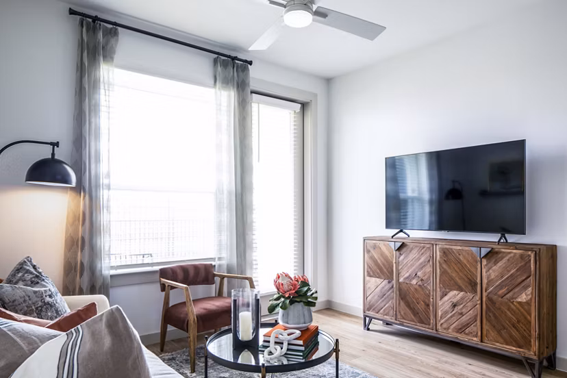 Spacious living room with modern furnishings at Broadstone Jordan Ranch Apartments