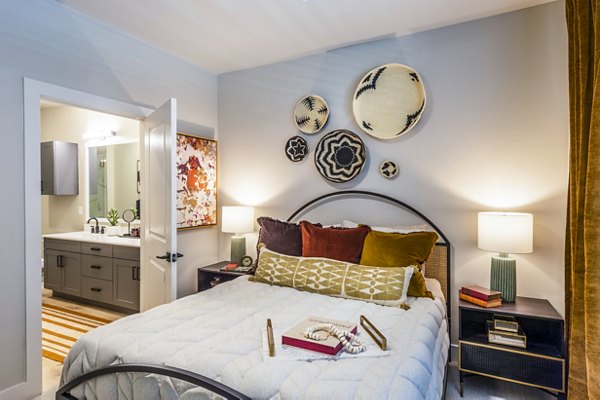 Spacious bedroom with modern decor in Lenox Grand West Apartments