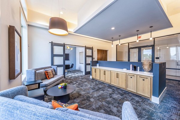 Luxurious clubhouse with modern seating and recreation areas at Lenox Grand West Apartments