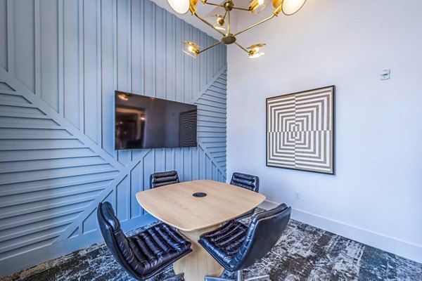 Clubhouse meeting facility with contemporary design at Lenox Grand West Apartments, perfect for social gatherings and events