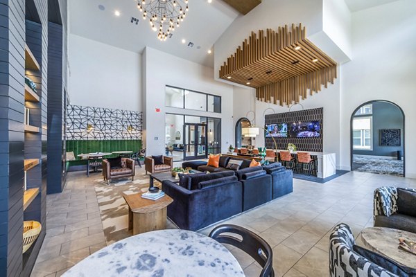 Elegant clubhouse lobby with modern decor at Lenox Grand West Apartments, a luxury community offering premium amenities and stylish interiors