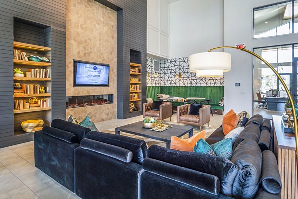 Clubhouse lobby with contemporary design elements at Lenox Grand West Apartments, offering a welcoming space for residents