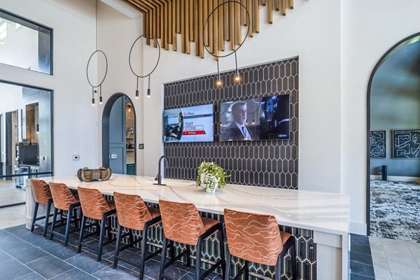 Clubhouse lobby with stylish seating and modern decor at Lenox Grand West luxury apartments