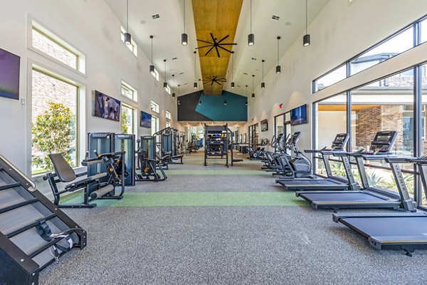 State-of-the-art fitness center with modern equipment at Lenox Grand West Apartments