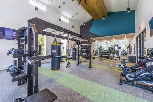 State-of-the-art fitness center with modern equipment at Lenox Grand West Apartments, promoting an active lifestyle for residents