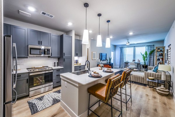 Renovated kitchen featuring stainless steel appliances at Lenox Grand West Apartments