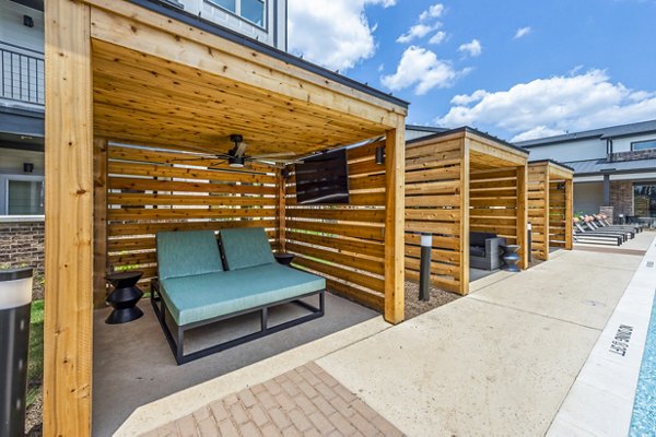 Luxurious pool cabanas at Lenox Grand West Apartments, perfect for relaxation and leisure in a premier residential setting
