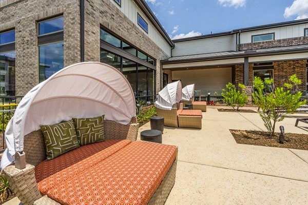 Relaxing poolside cabanas at Lenox Grand West Apartments, perfect for luxury living near the heart of the city