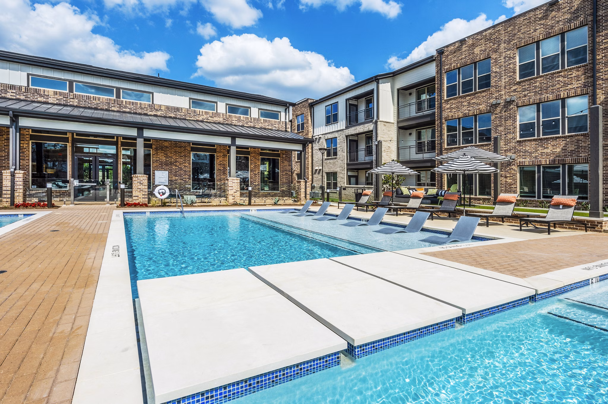 Resort-style pool at Lenox Grand West Apartments, perfect for relaxing in luxury surroundings