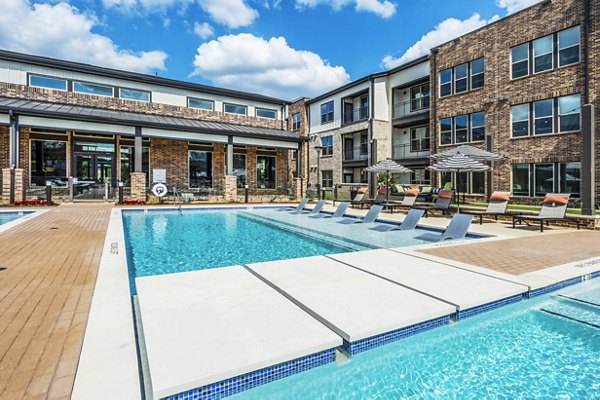 Resort-style pool at Lenox Grand West Apartments, perfect for relaxing in luxury surroundings