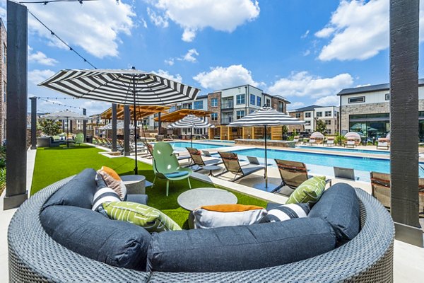 Luxurious poolside cabana at Lenox Grand West Apartments: Modern retreat with comfortable seating and a serene ambiance for relaxation