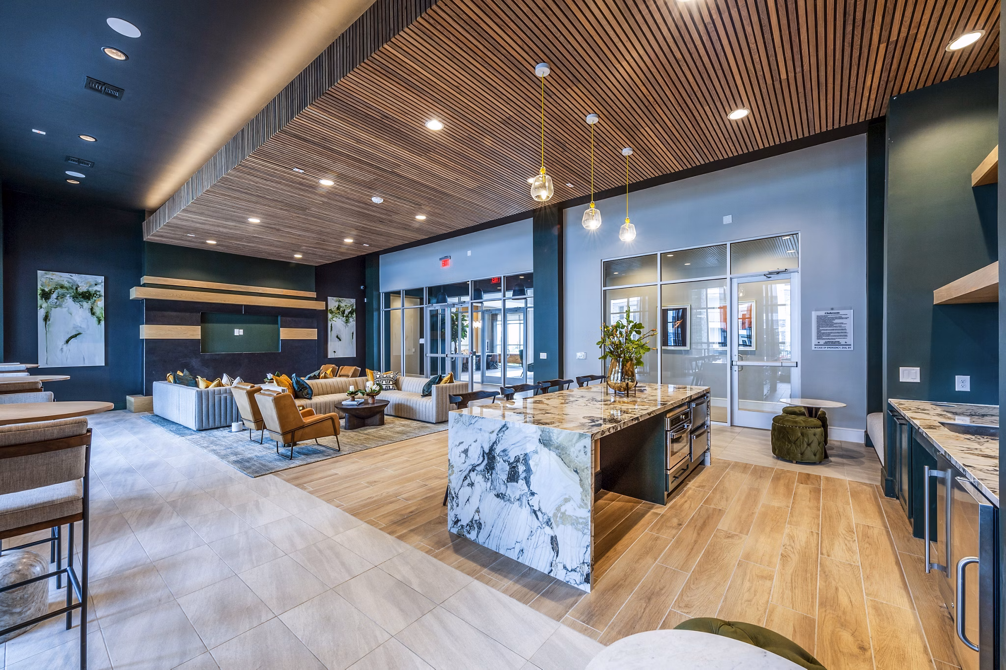 Elegant clubhouse lobby with modern furnishings at The Madison Apartments