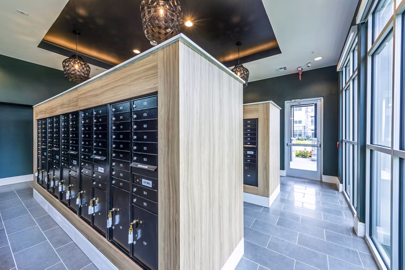 Modern clubhouse mail room with parcel lockers at The Madison Apartments