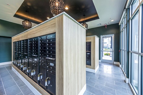 Modern clubhouse mail room with parcel lockers at The Madison Apartments