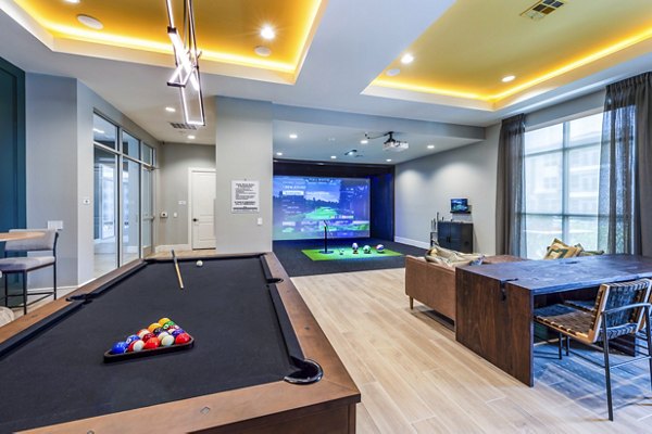 clubhouse game room at The Madison Apartments