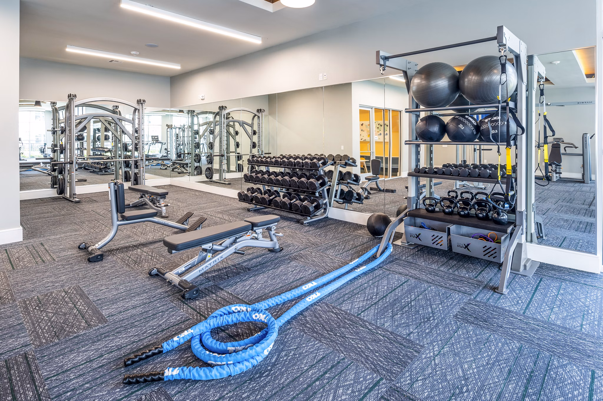 Fitness center with state-of-the-art equipment at The Madison Apartments
