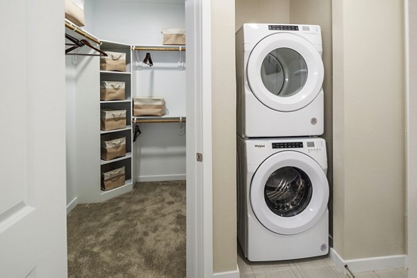 laundry room/bathroom closet at The Madison Apartments