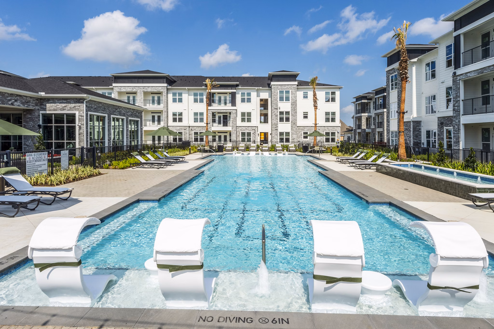 Elegant outdoor pool at The Madison Apartments, Greystar luxury apartments
