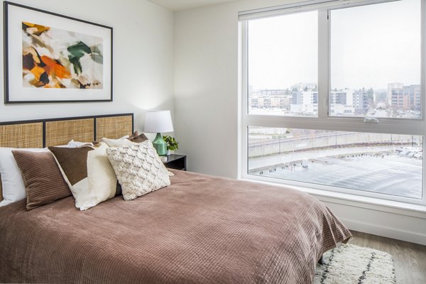 Cozy bedroom with modern decor at Broadstone Claro Apartments