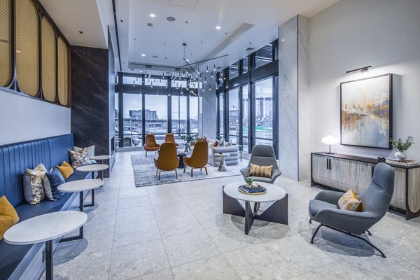 Clubhouse lobby featuring modern seating and contemporary decor at Broadstone Claro Apartments