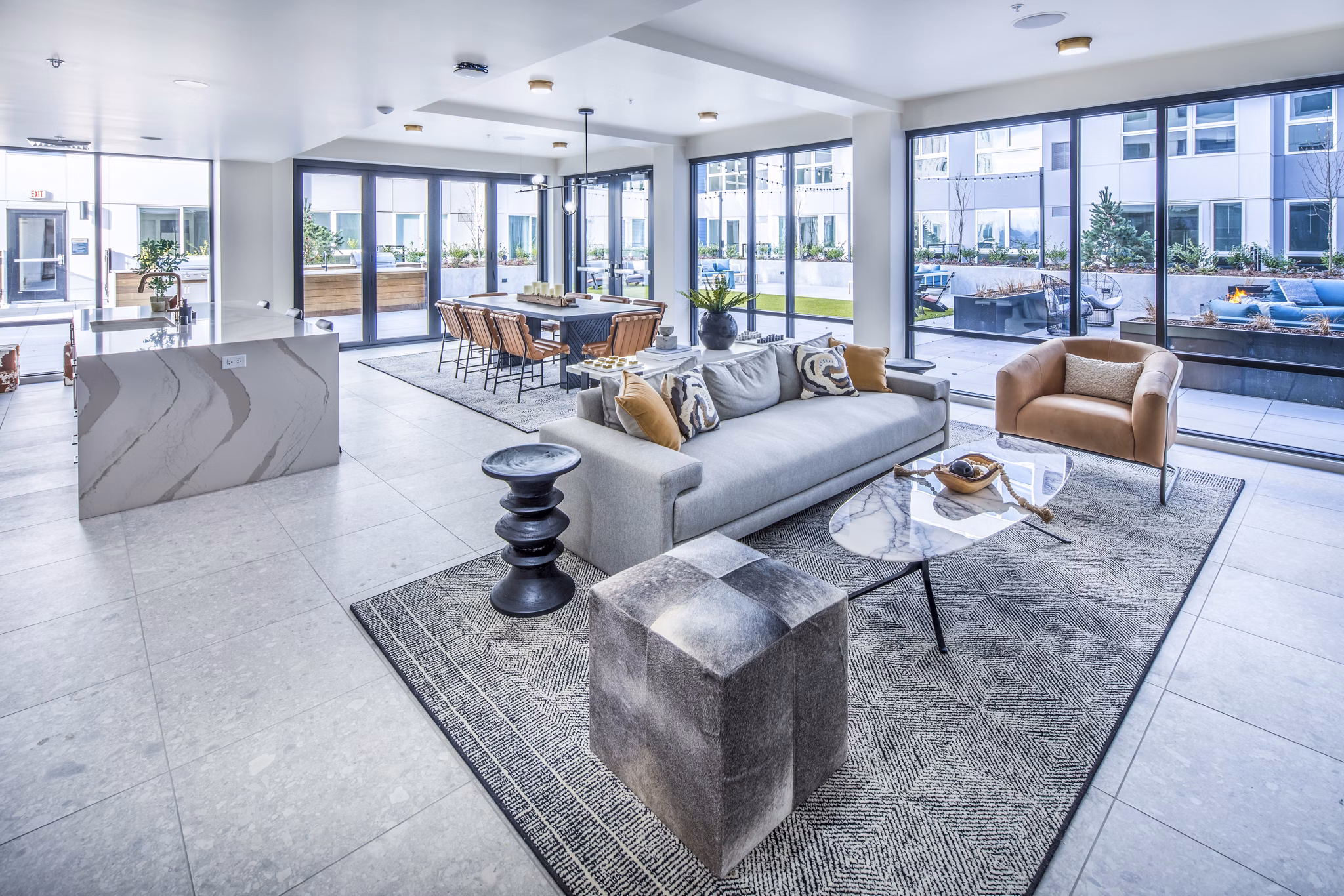 Elegant clubhouse lobby featuring modern decor and seating at Broadstone Claro Apartments