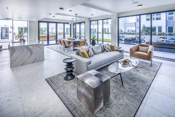 Elegant clubhouse lobby featuring modern decor and seating at Broadstone Claro Apartments