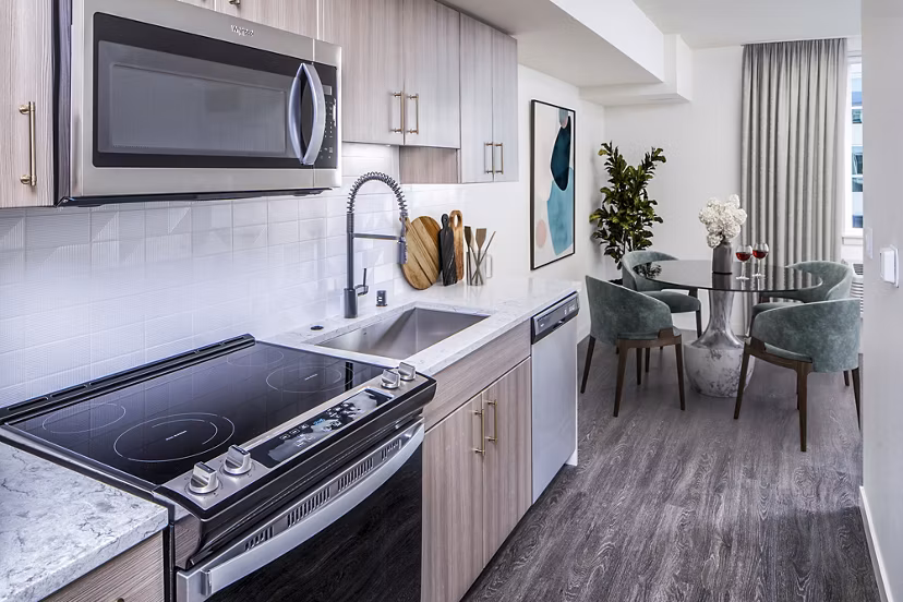 Modern kitchen with stylish cabinetry and stainless steel appliances in Broadstone Claro Apartments luxury residences