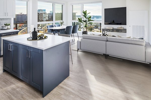 Spacious living room with contemporary furnishings in Broadstone Claro Apartments, offering luxury and comfort for residents