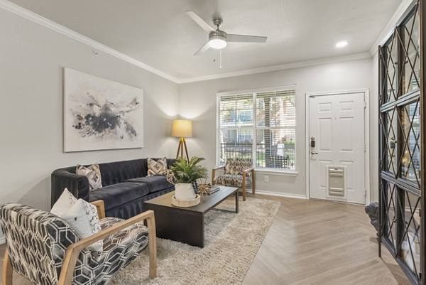 living room at Cross Creek at Grapevine Ranch Apartments