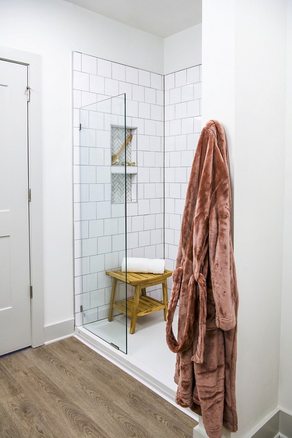 Bathroom with modern fixtures and sleek design at Lakehouse on Wylie Apartments