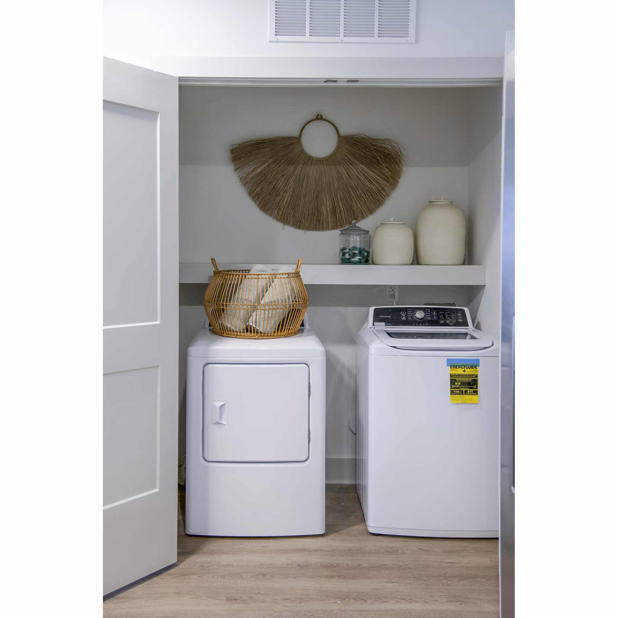 Laundry room with modern appliances at Lakehouse on Wylie Apartments