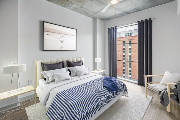 Cozy bedroom with modern decor in Atlantic on Romney Apartments
