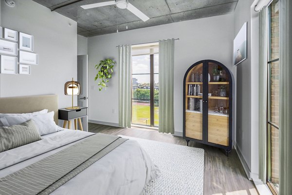 Cozy bedroom with elegant decor in Atlantic on Romney Apartments