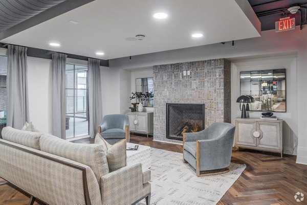Stylish clubhouse with plush seating at Atlantic on Romney Apartments, perfect for social gatherings and relaxation