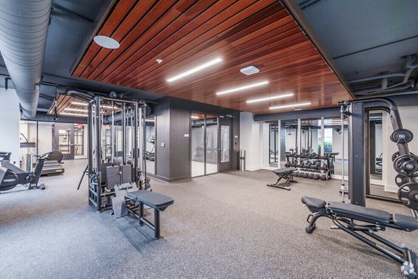 State-of-the-art fitness center at Atlantic on Romney Apartments featuring modern exercise equipment