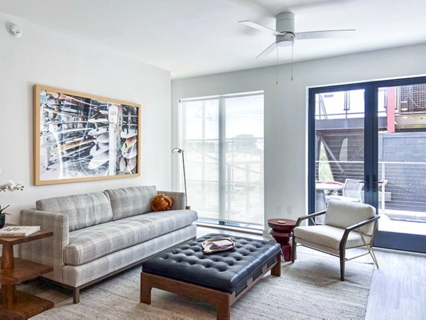 Elegant living room with contemporary decor at Atlantic on Romney Apartments
