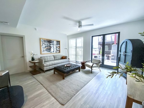Modern living room with sleek furniture at Atlantic on Romney Apartments