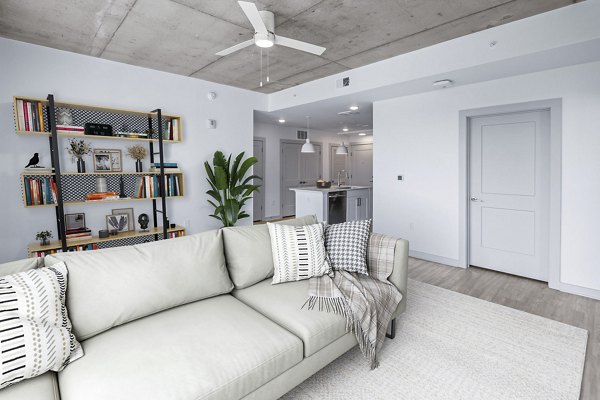 Modern living room with sleek furnishings at Atlantic on Romney Apartments, offering luxury in Greystar's premium Charleston location