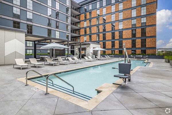Rooftop pool with city skyline views at Atlantic on Romney Apartments