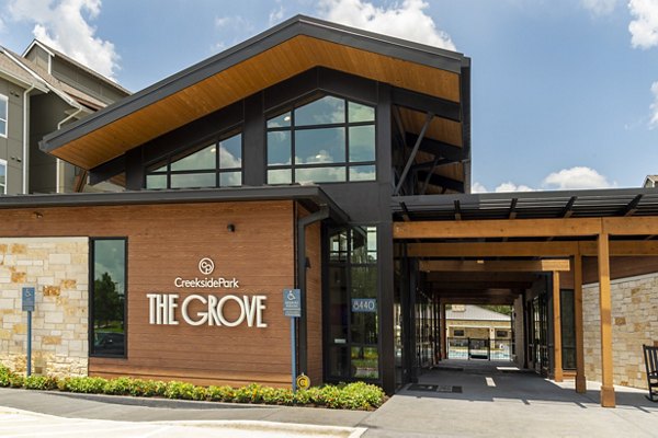 Creekside Park The Grove: Modern luxury apartments surrounded by lush landscapes in desirable neighborhood