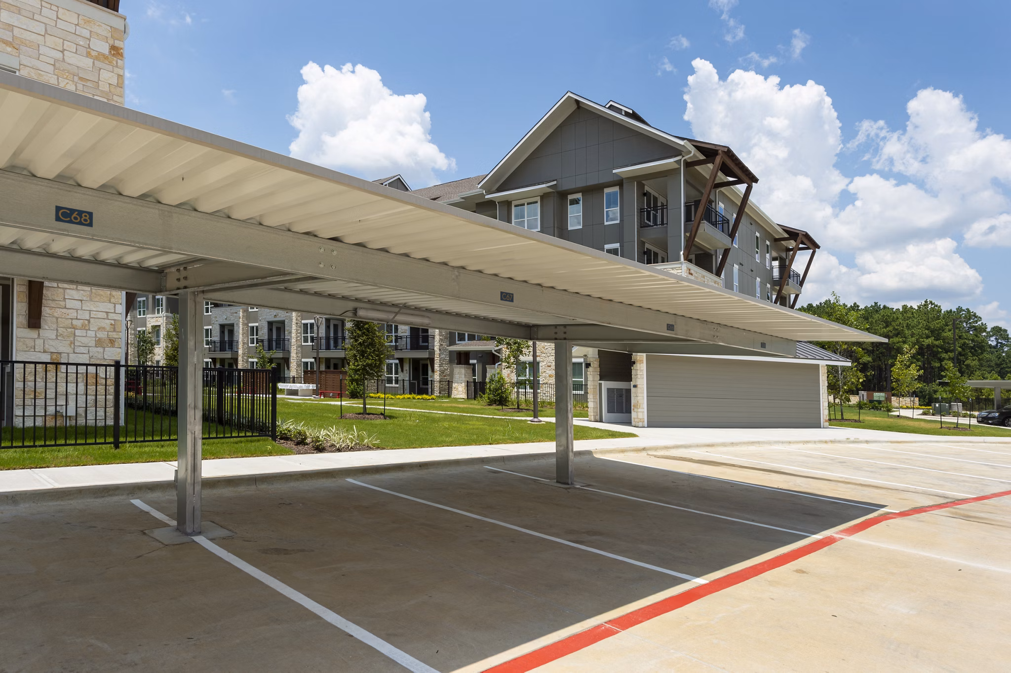 Covered parking at Creekside Park The Grove Apartments, ideal for luxury living with convenience and protection from the elements