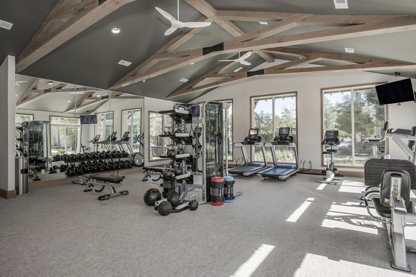 Modern fitness center featuring state-of-the-art equipment at Creekside Park The Residences