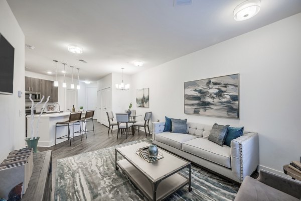 Stylish living room with modern furnishings in Creekside Park The Residences