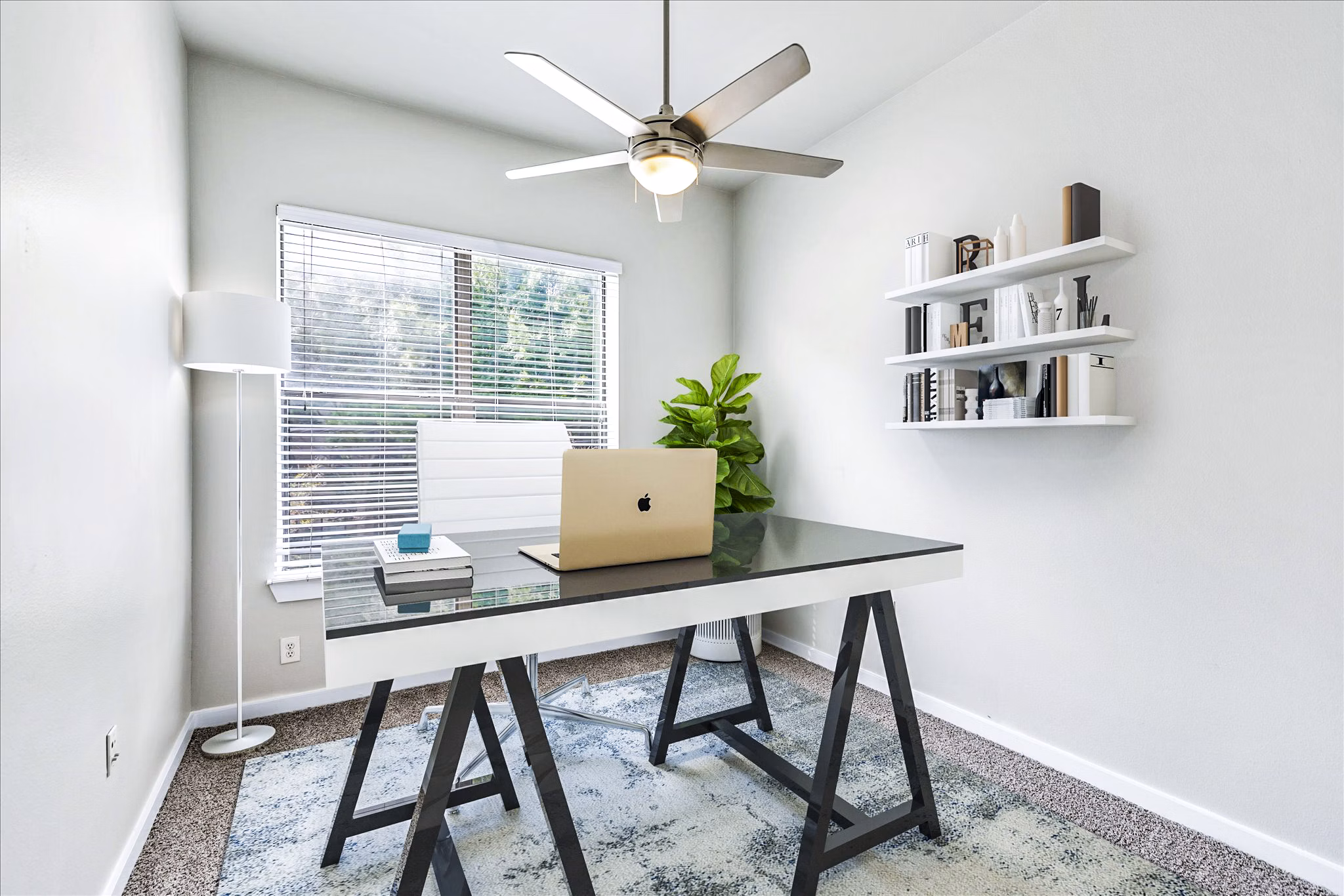 Cozy bedroom with modern decor at The Dylan Apartments in vibrant city setting