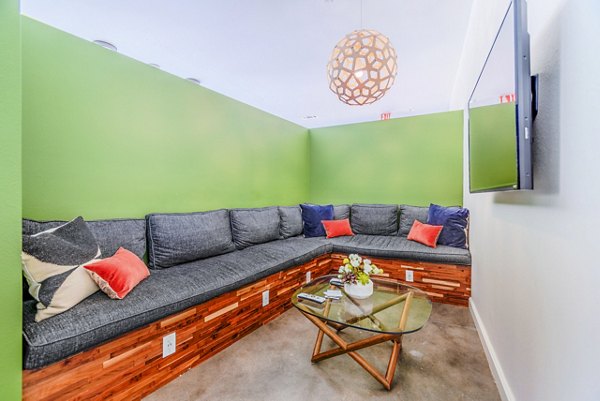 Clubhouse featuring modern interiors and social lounge at The Dylan Apartments in Greystar community