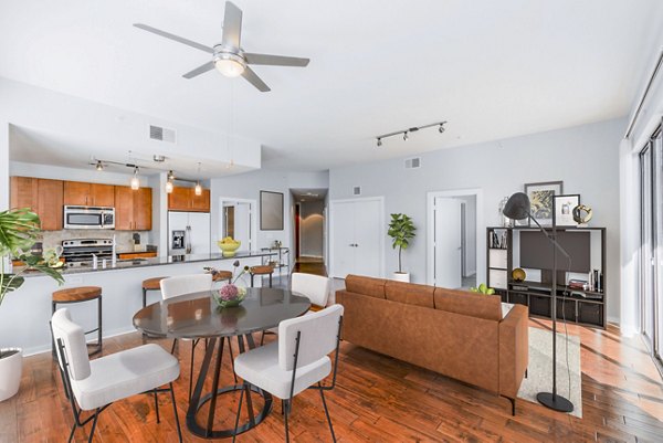 Modern living room with stylish decor at The Dylan Apartments, featuring luxury design elements and an inviting atmosphere