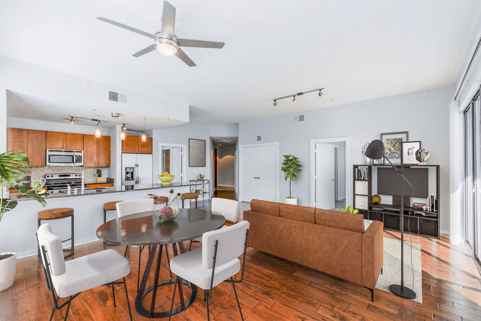 Modern living room with stylish decor at The Dylan Apartments, featuring luxury design elements and an inviting atmosphere