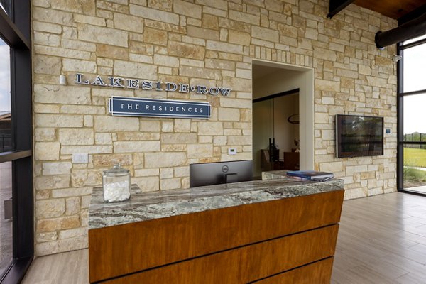 Clubhouse with modern decor and cozy seating at Lakeside Row Apartments