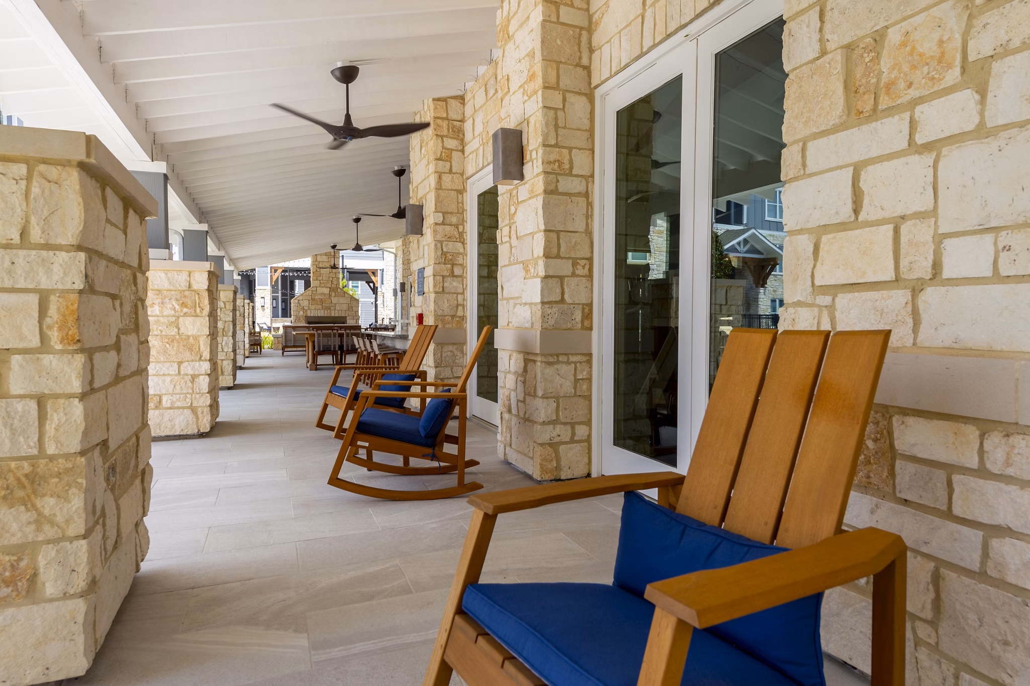 Outdoor patio with lounge seating at Lakeside Row Apartments