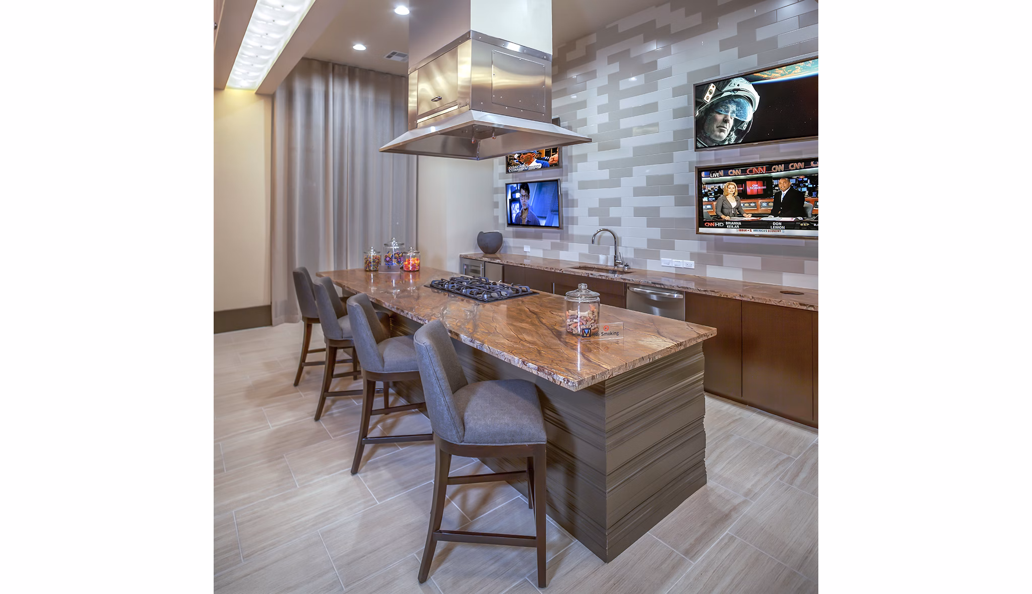 Clubhouse at The Millennium Six Pines Apartments: Elegant space with modern decor and seating, ideal for community gatherings in luxury apartments